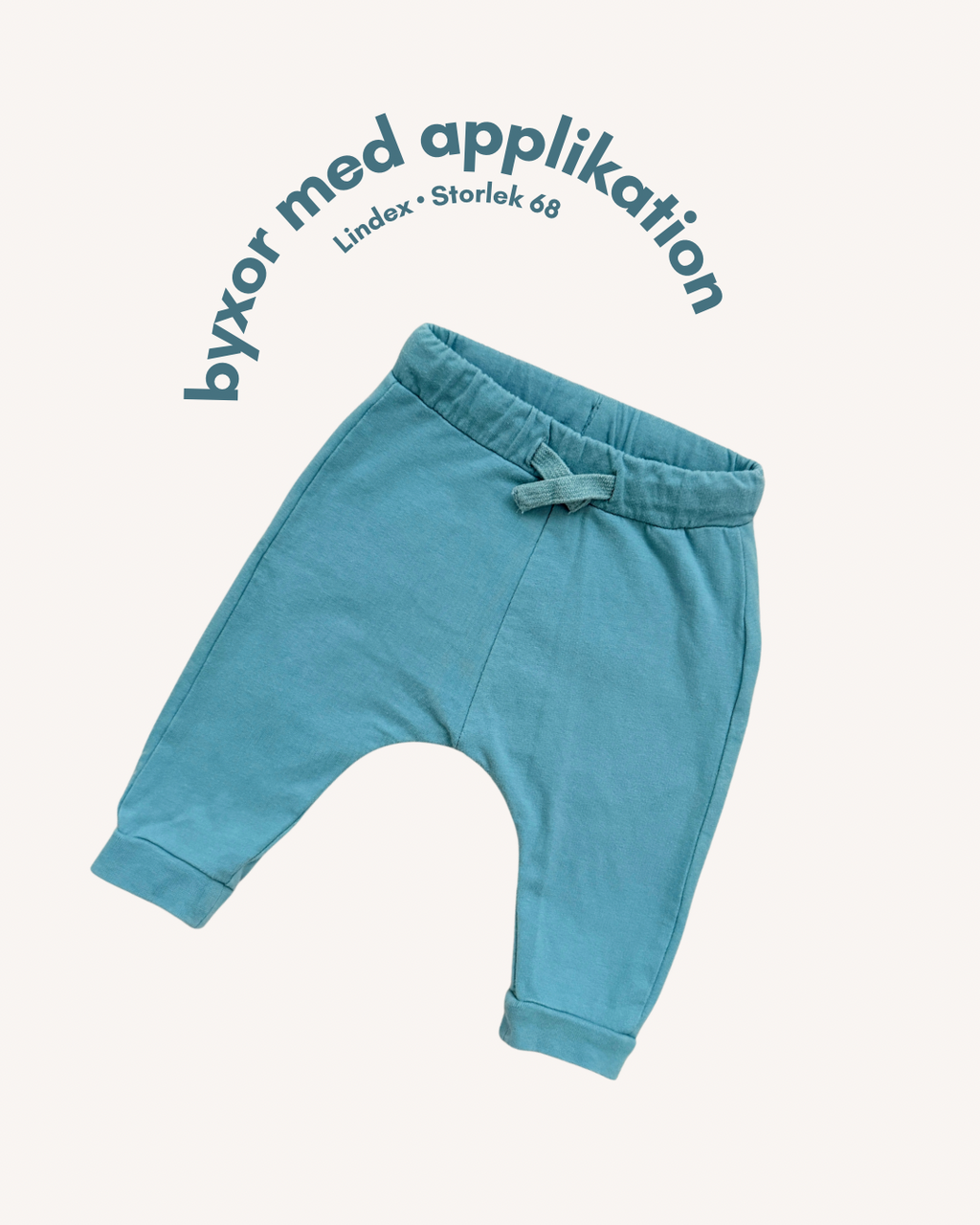Byxor med applikation - Storlek 68